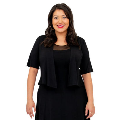 female model wearing black doda jacket  front view on white background