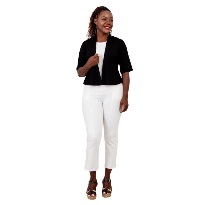 female model wearing black doda jacket, black reanna tank top and white nadine cropped pants front view on white background