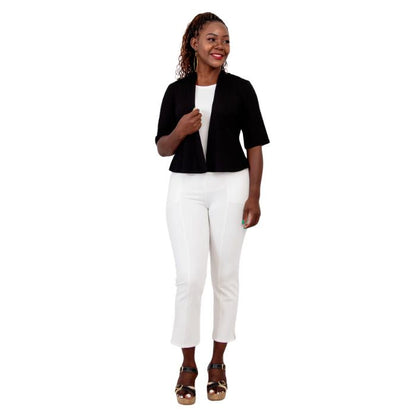 female model wearing black doda jacket, black reanna tank top and white nadine cropped pants front view on white background