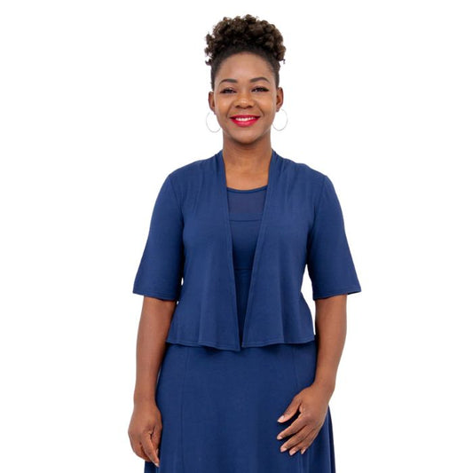 female model wearing indigo blue doda jacket front view on white background