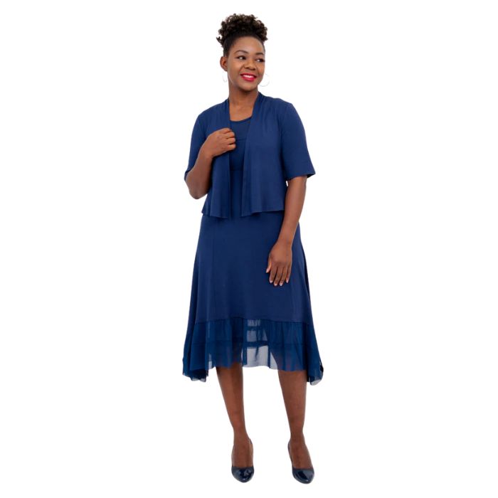 female model wearing indigo blue doda jacket and indigo blue danube dress front view on white background