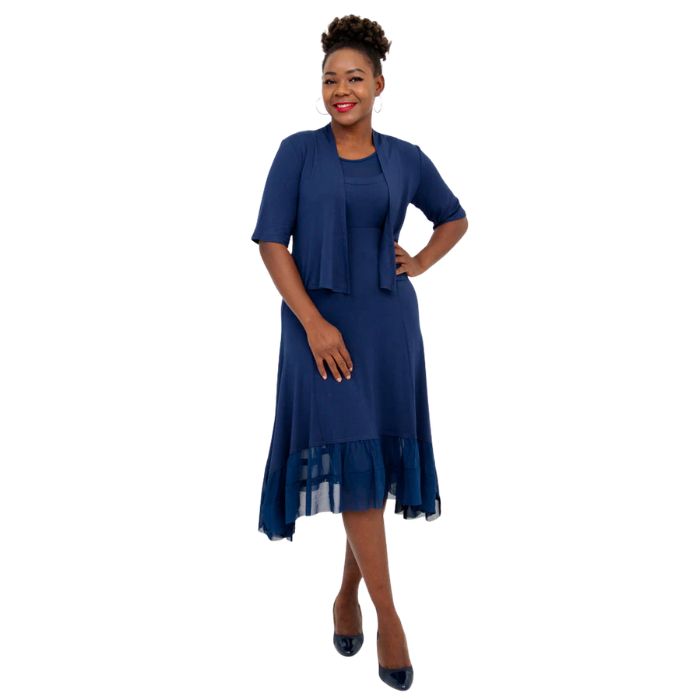 female model wearing indigo blue doda jacket and indigo blue danube dress front view on white background