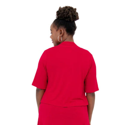 female model wearing lipstick red doda jacket back view on white background
