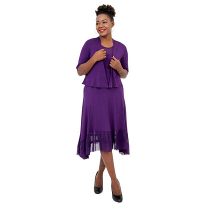 female model wearing royale purple doda jacket and royale purple danube dress front view on white background
