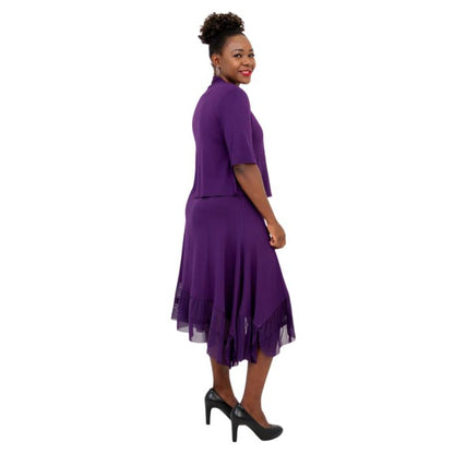 female model wearing royale purple doda jacket and royale purple danube dress side view on white background