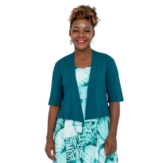 female model wearing teal green doda jacket front view on white background