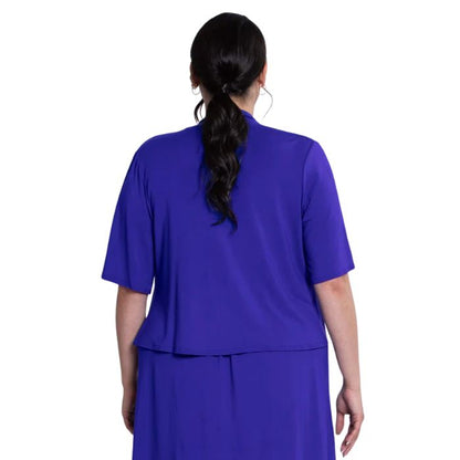 female model wearing violet purple doda jacket back view on white background