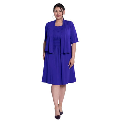 female model wearing violet purple doda jacket and violet purple roam dress front view on white background