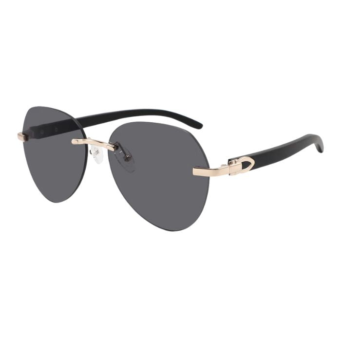 dragon frameless style sunglasses with black lenses over view of sunglasses on white background