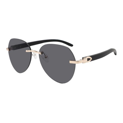 dragon frameless style sunglasses with black lenses over view of sunglasses on white background