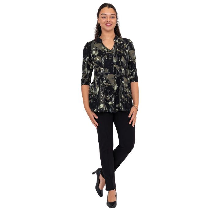 female model wearing khaki oak print edwina top and black nadia pants front view on white background