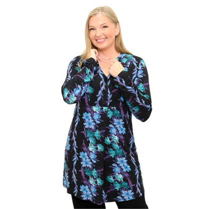 a woman wearing blue hour print edwina tunic waist up front view set on a studio white background