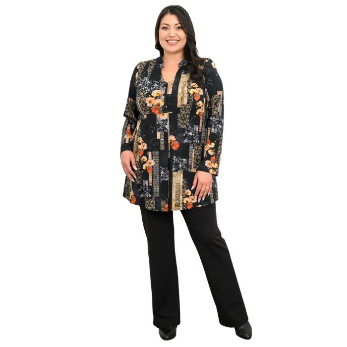 a woman wearing golden garden print edwina tunic top and black daya pants front view set on a studio white background