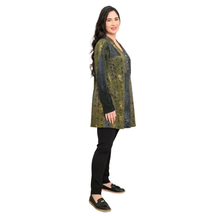 a woman wearing rustic khaki print edwina tunic top and black nadia pants side view set on a studio white background