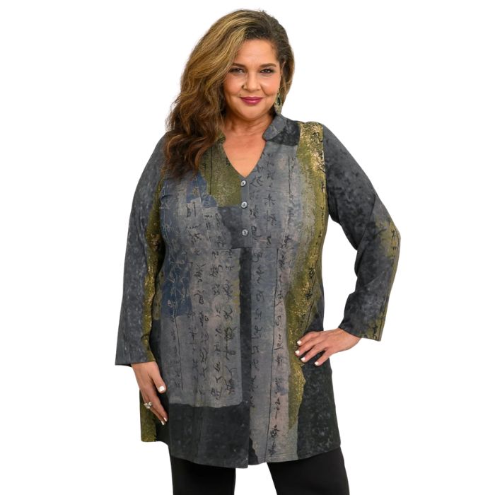 a woman wearing rustic khaki print edwina tunic waist up front view set on a studio white background