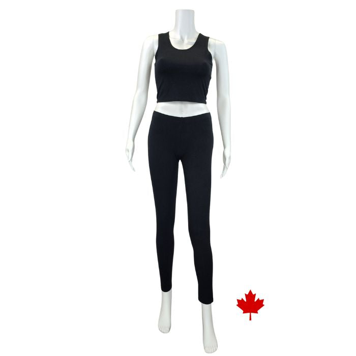 bottom of white mannequin wearing black elle full length leggings and black stephanie crop tank top front view on white background