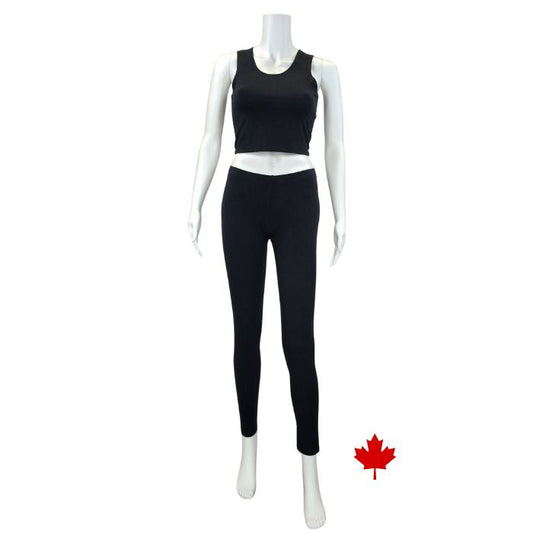bottom of white mannequin wearing black elle full length leggings and black stephanie crop tank top front view on white background