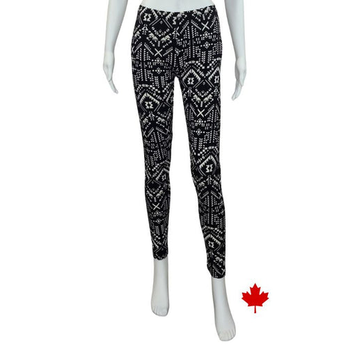 bottom of white mannequin wearing geometric elle full length leggings front view on white background