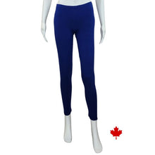 bottom of white mannequin wearing indigo blue elle full length leggings front view on white background