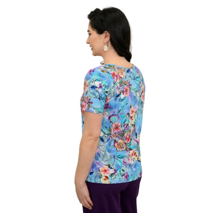 female model wearing teal nectar print emery top back view on white background