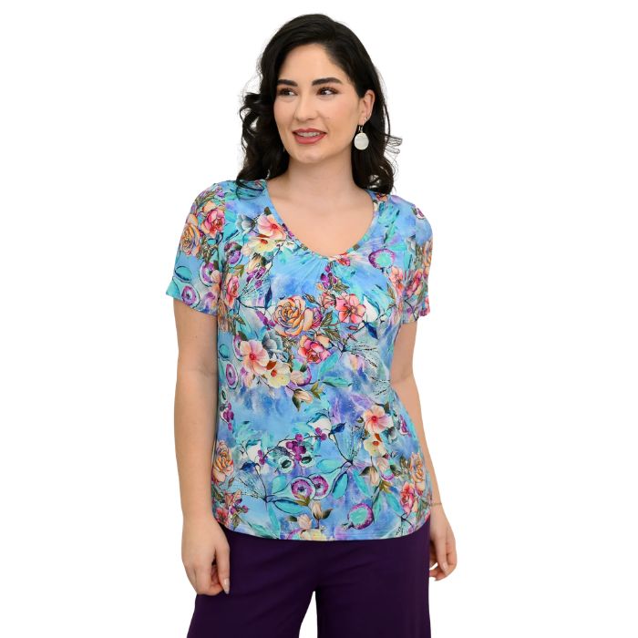 female model wearing teal nectar print emery top front view on white background
