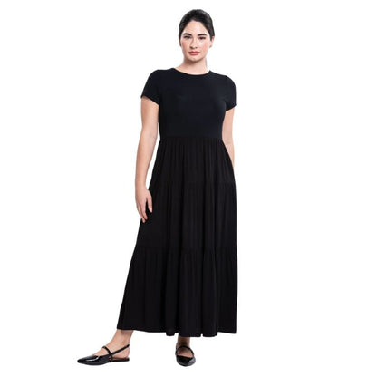 female model wearing black erin dress front view on white background