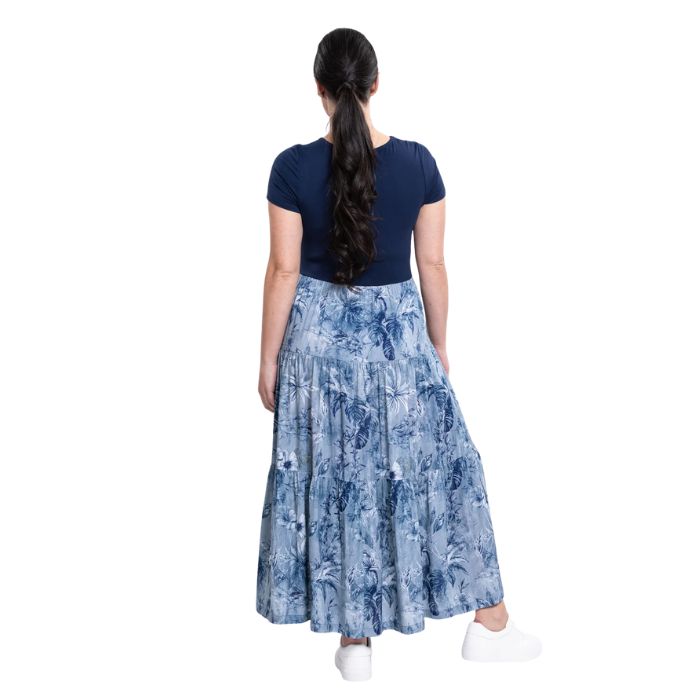 female model wearing indigo escape print erin dress back view on white background
