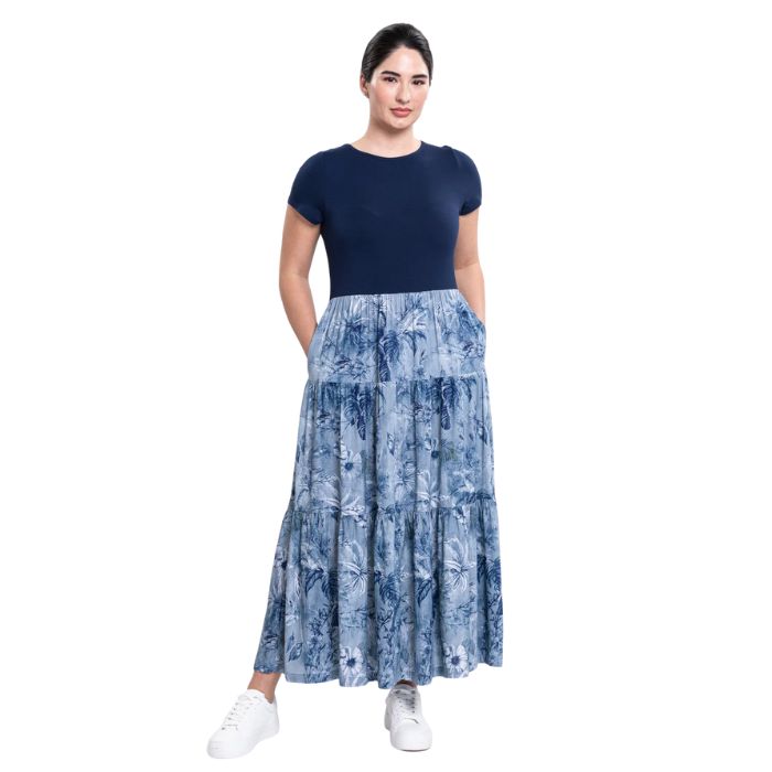 female model wearing indigo escape print erin dress front view on white background