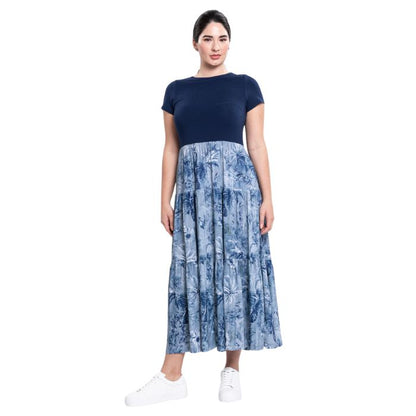 female model wearing indigo escape print erin dress front view on white background