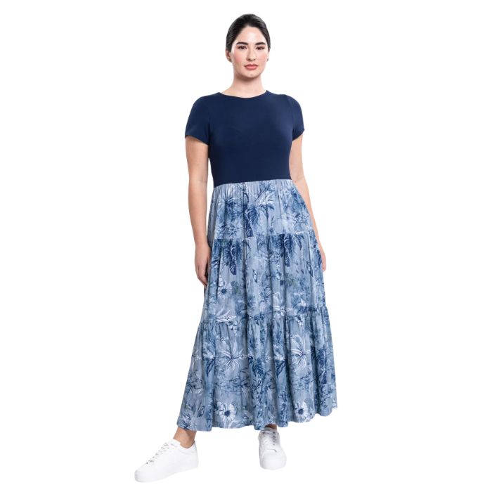 female model wearing indigo escape print erin dress front view on white background