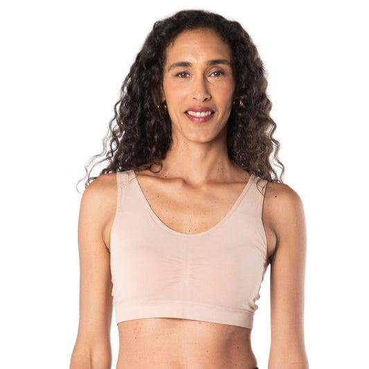 female model wearing beige brown essential bralette front view on white background
