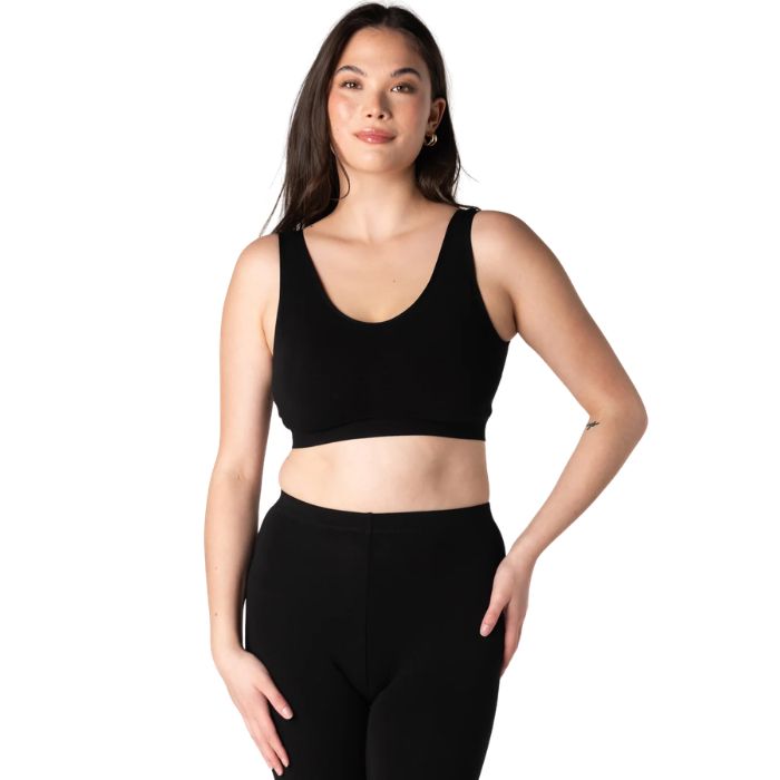 emale model wearing black essential bralette front view on white background