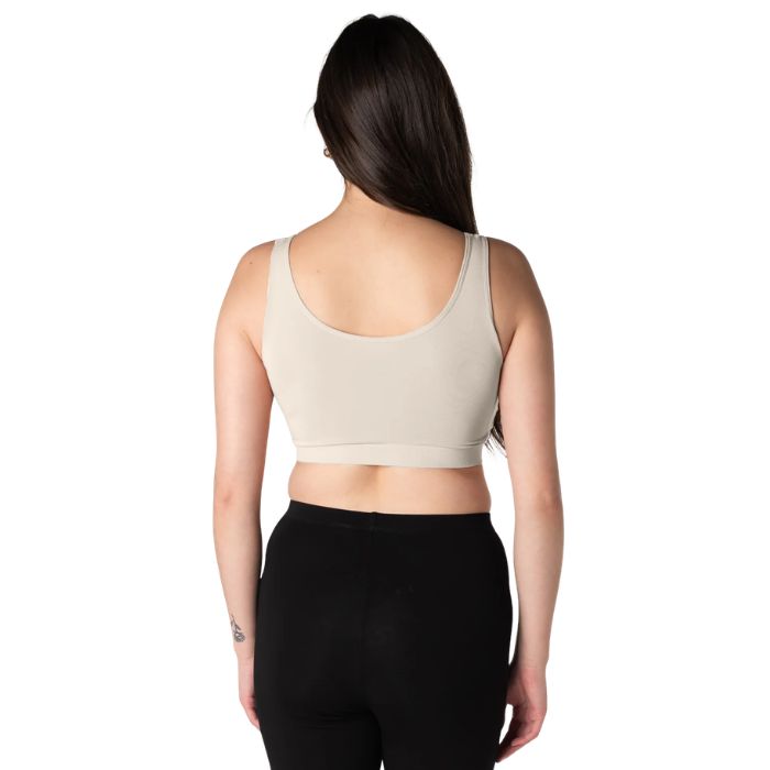 female model wearing cream white essential bralette back view on white background