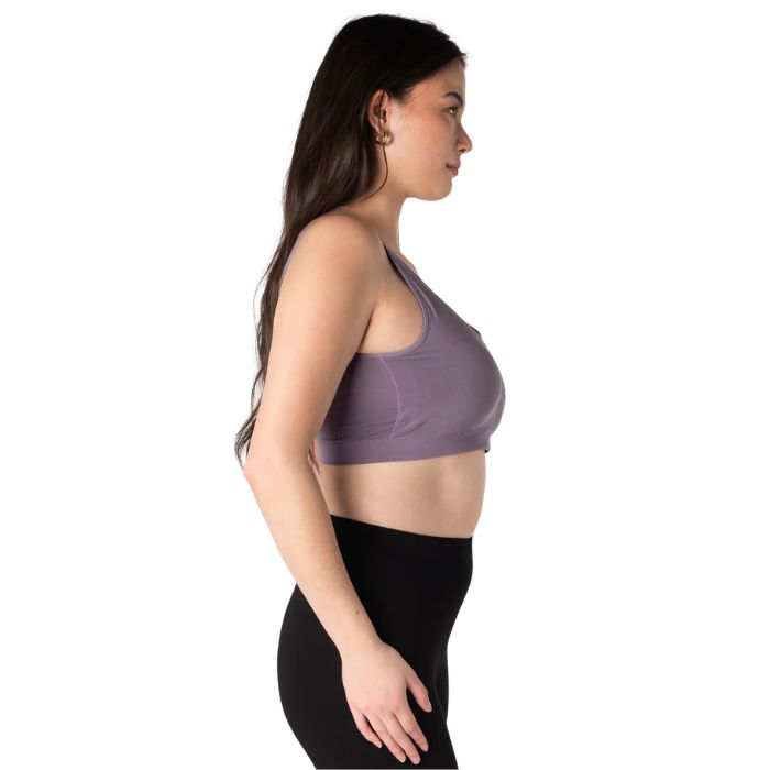 female model wearing dusty purple essential bralette side view on white background