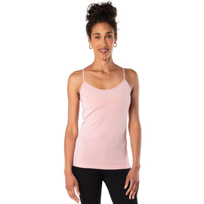 top of female model wearing pink essential cami tank top front view on white background