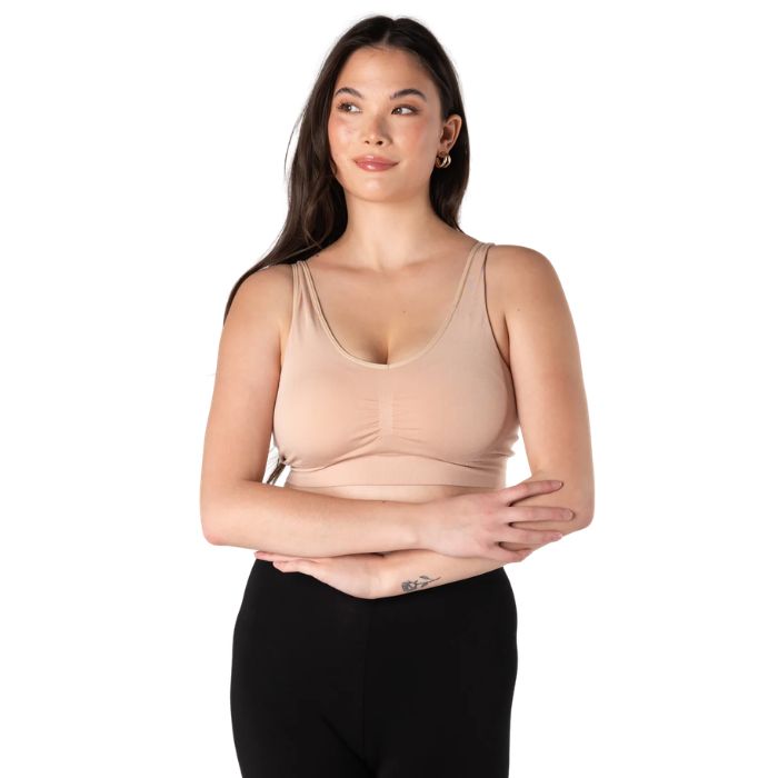 female model wearing beige brown terrera essential v-neck bralette front view on white background