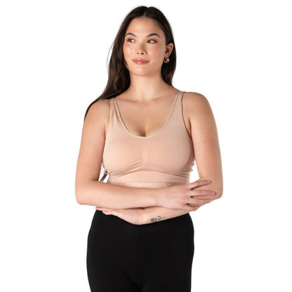 female model wearing beige brown terrera essential v-neck bralette front view on white background