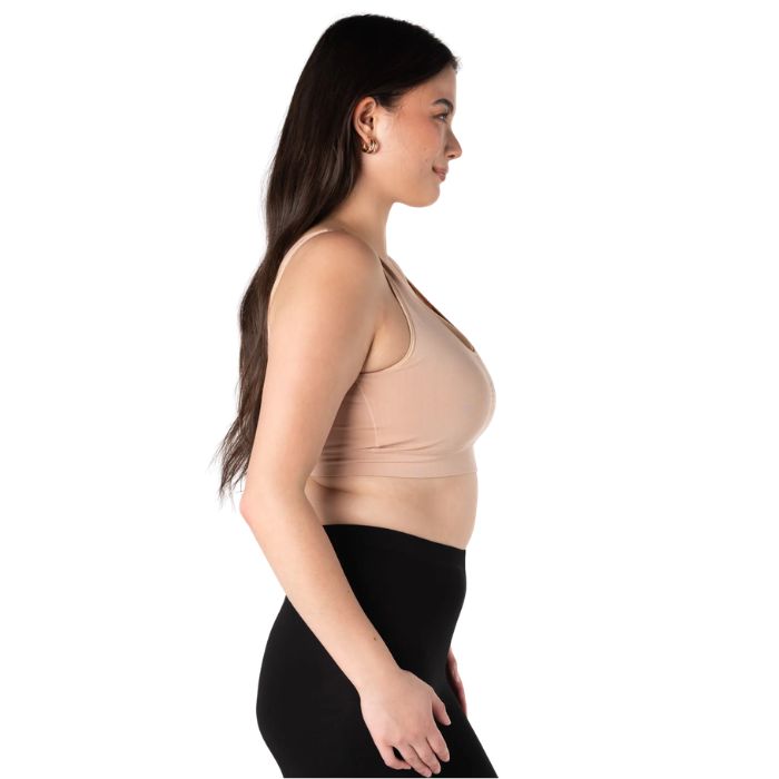 female model wearing beige brown terrera essential v-neck bralette side  view on white background