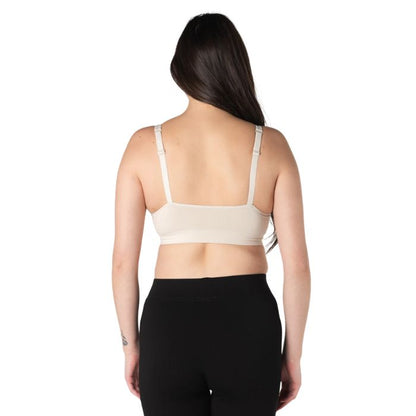 female model wearing cream white everyday adjustable bralette back view on white background