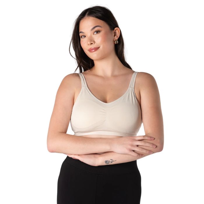 female model wearing cream white everyday adjustable bralette front view on white background