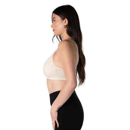 female model wearing cream white everyday adjustable bralette side view on white background