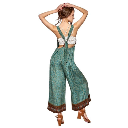 female model wearing friendly overalls mixed prints back view on white background