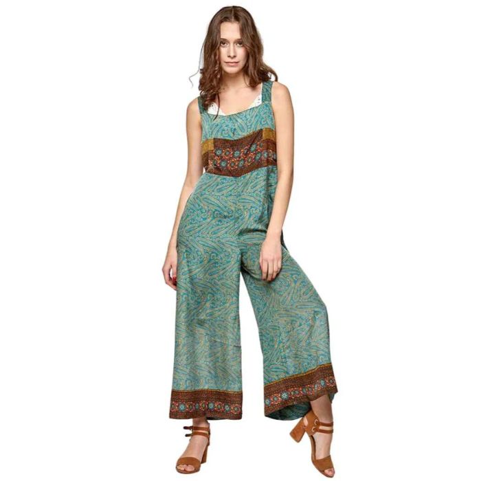 female model wearing friendly overalls mixed prints front view on white background