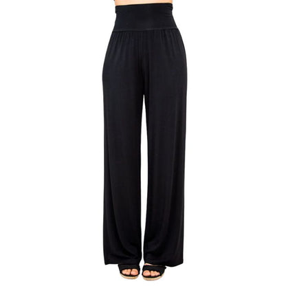 female model wearing black gaylene pants front view on white background