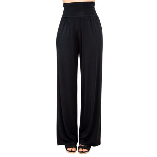 female model wearing black gaylene pants front view on white background