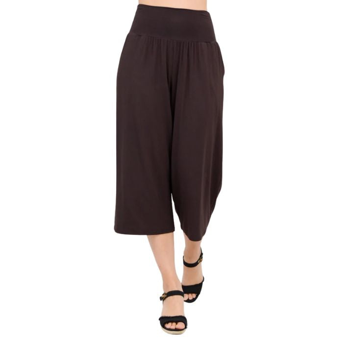 female model wearing coffee brown gaylene capri pants front view on white background