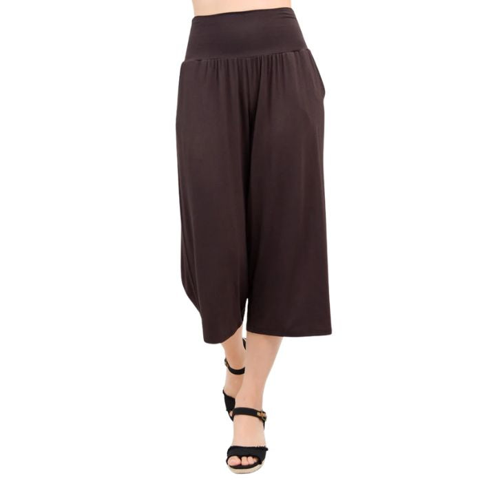 female model wearing coffee brown gaylene capri pants front view on white background