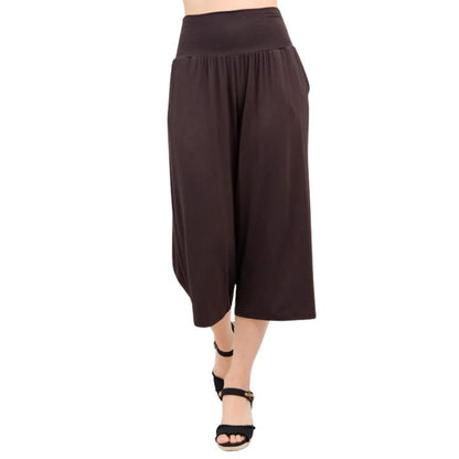 female model wearing coffee brown gaylene capri pants front view on white background