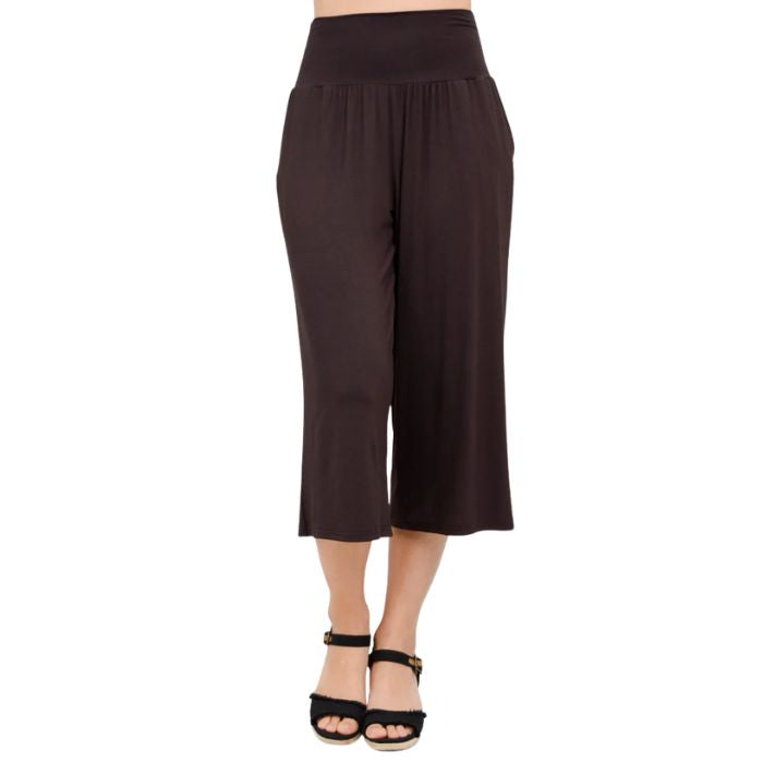 female model wearing coffee brown gaylene capri pants front view on white background