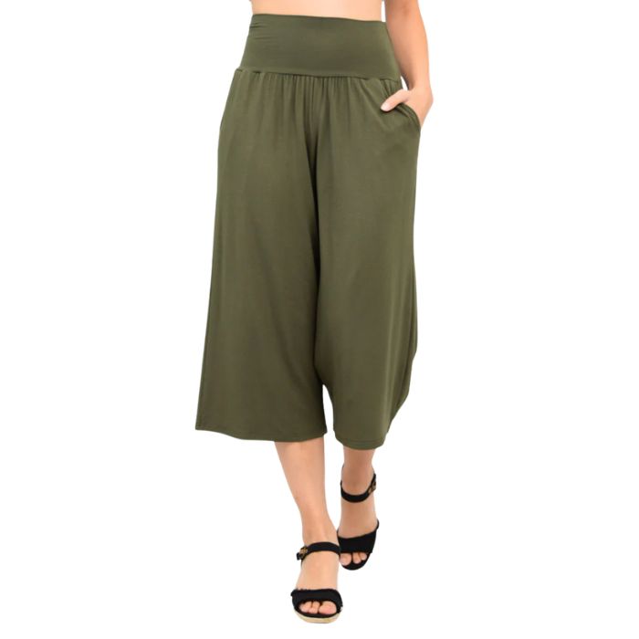 female model wearing khaki green gaylene capri pants front view on white background